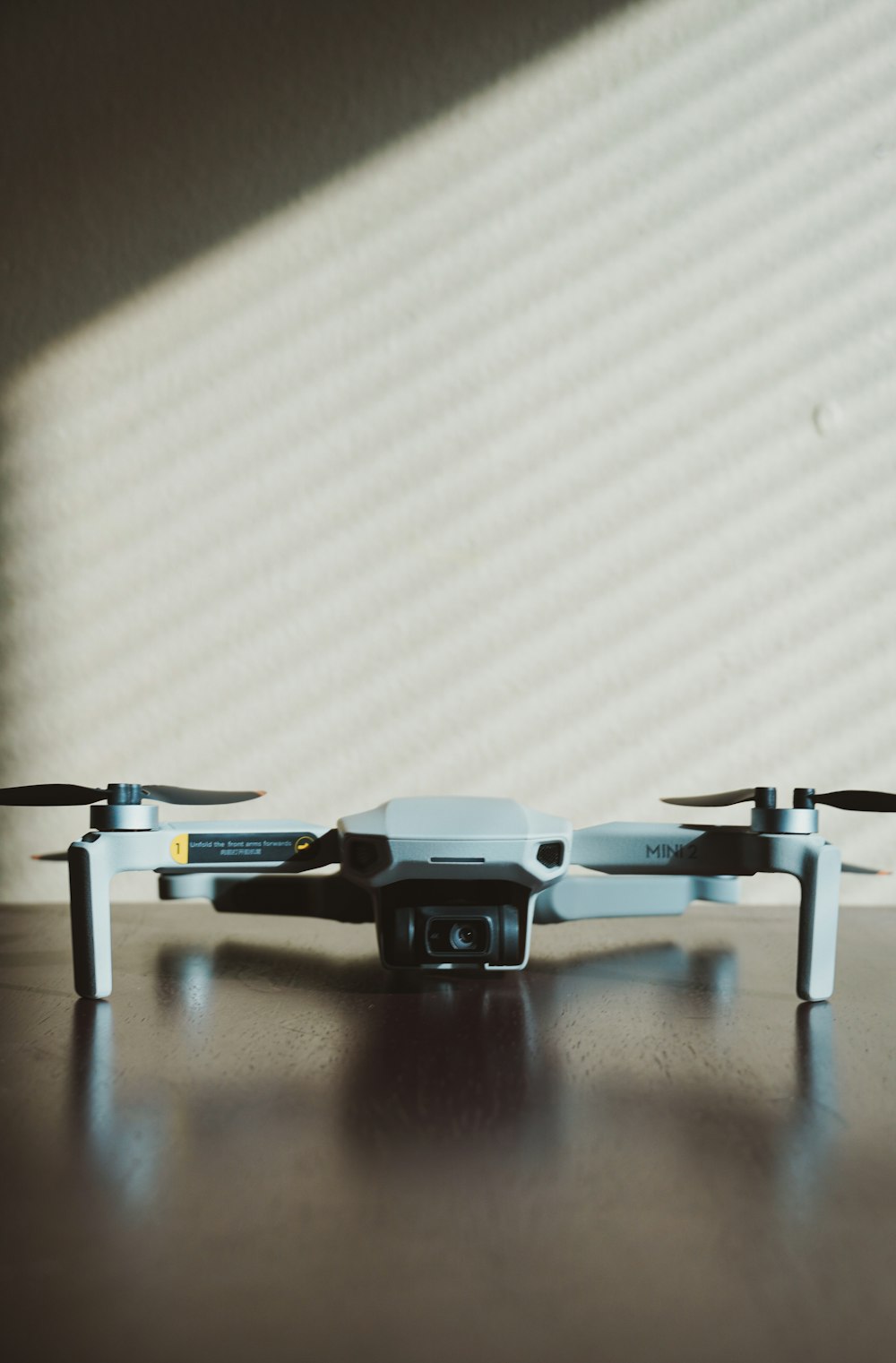 a close up of a remote control device on a table