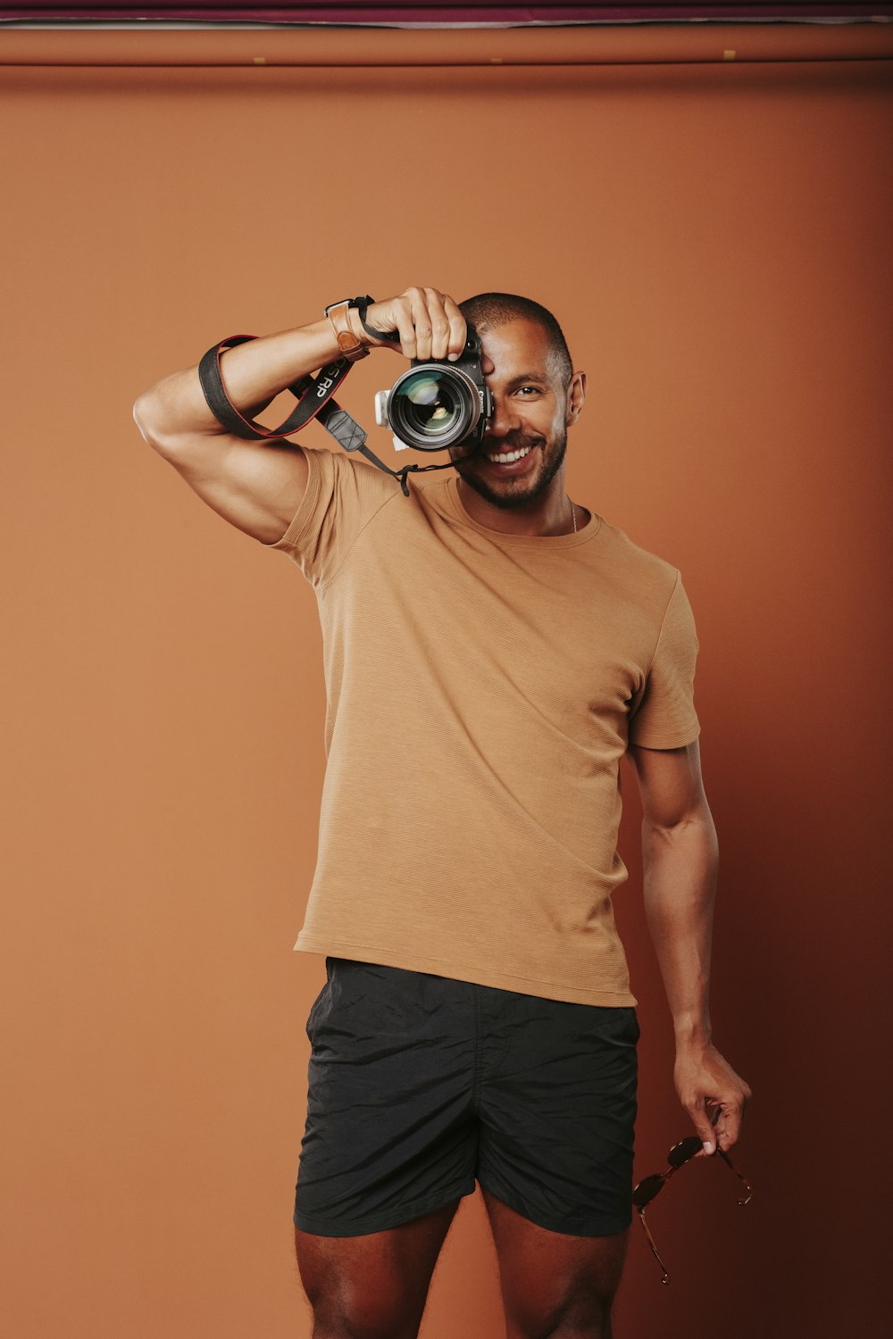 a man taking a picture of himself with a camera