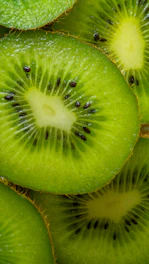 a close up of a kiwi fruit sliced in half