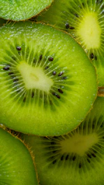 a close up of a kiwi fruit sliced in half