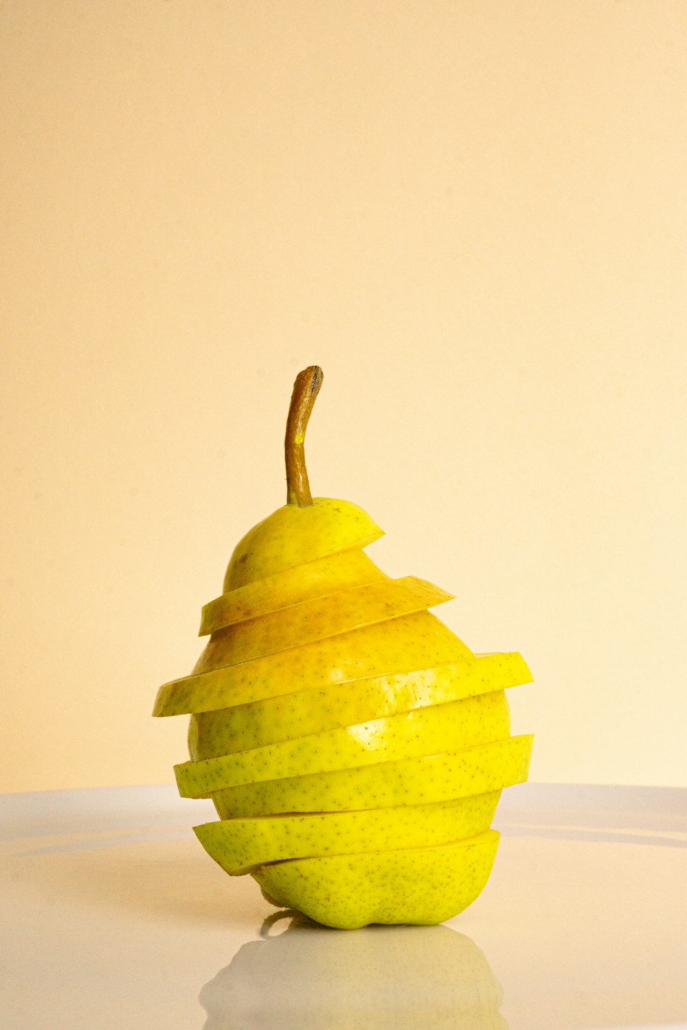 a cut up apple sitting on top of a table
