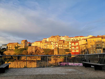 Balcony overlooking the old town of Zamora at sunset, capturing its charm.