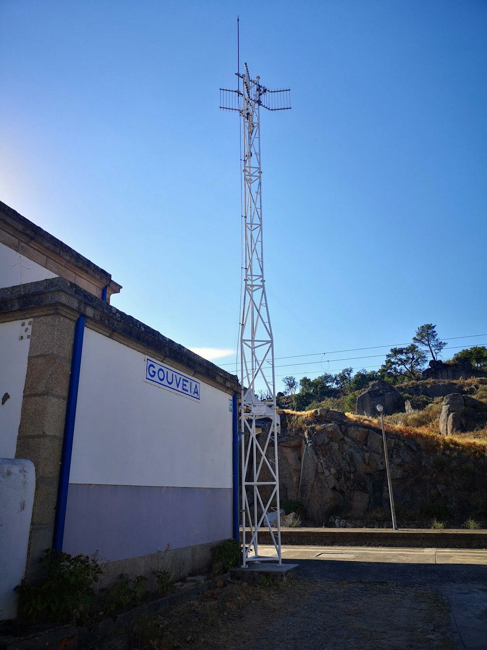 a cell phone tower next to a building