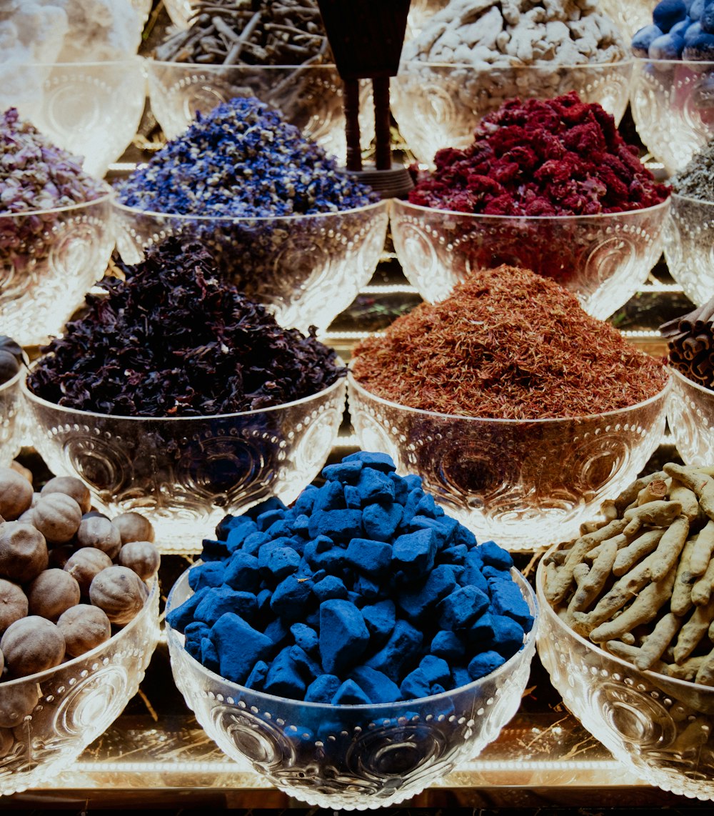 a table topped with bowls filled with different types of food