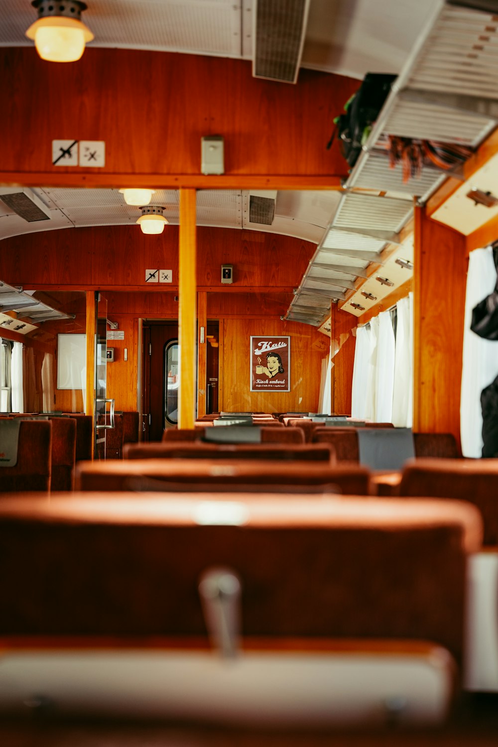 a view of a dining car on a train