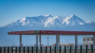 A sleek blue and white petroleum pump station under a clear sky, showcasing jiatong's equipment in action.