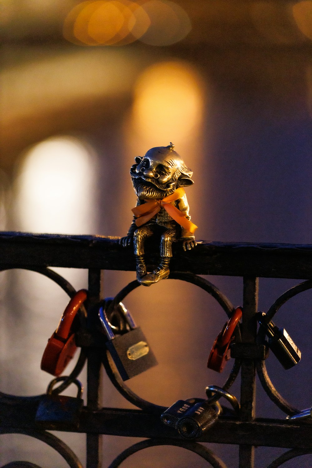 a bunch of locks attached to a fence