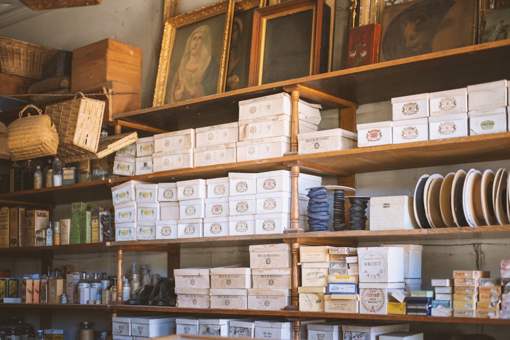 a shelf filled with lots of boxes and boxes