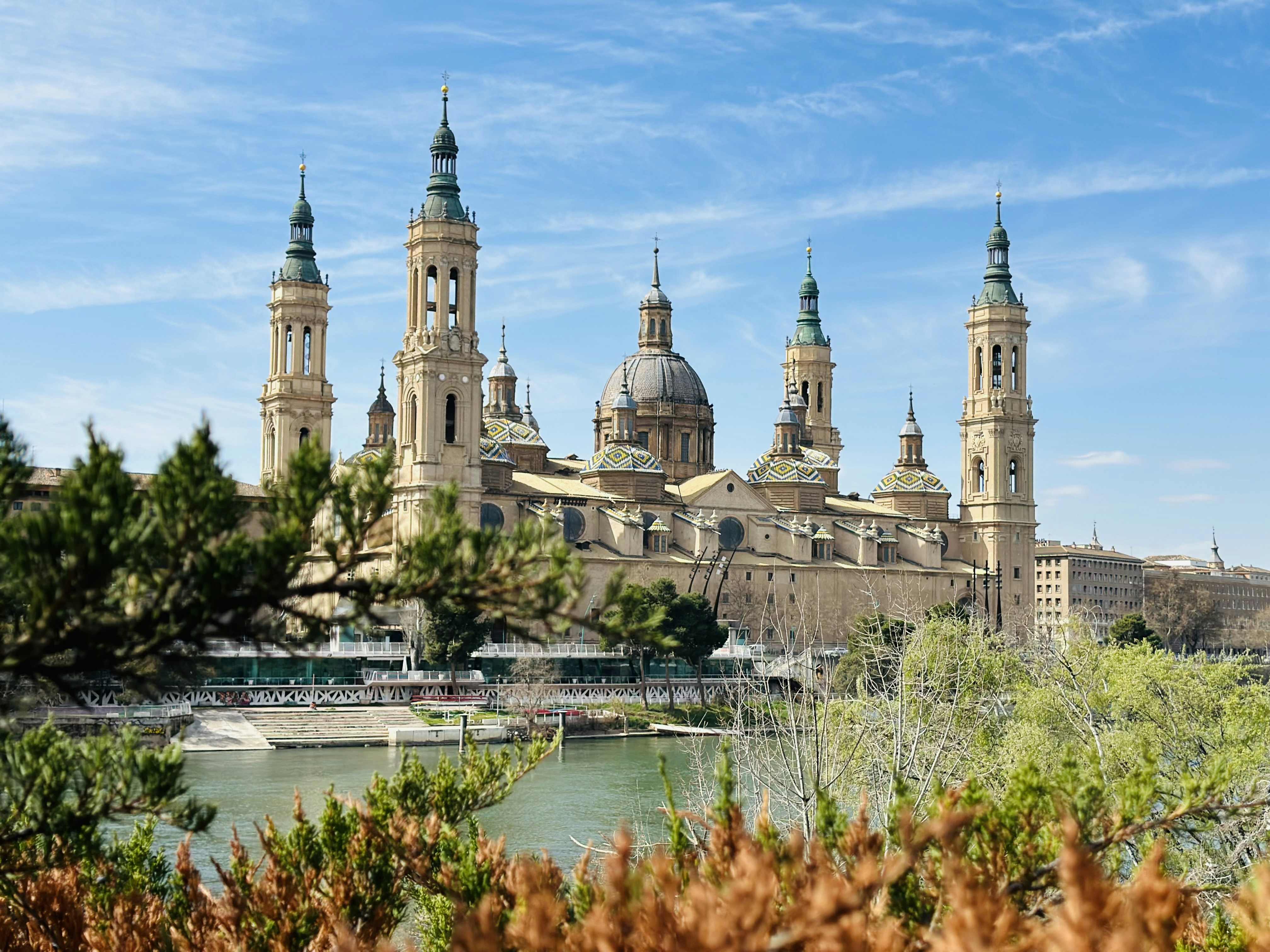 a large building with towers on top of it
