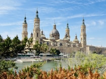 a large building with towers on top of it