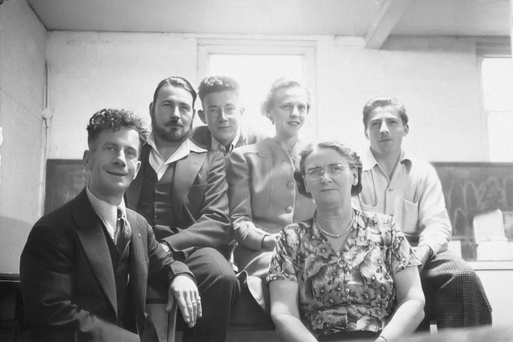 a black and white photo of a group of people