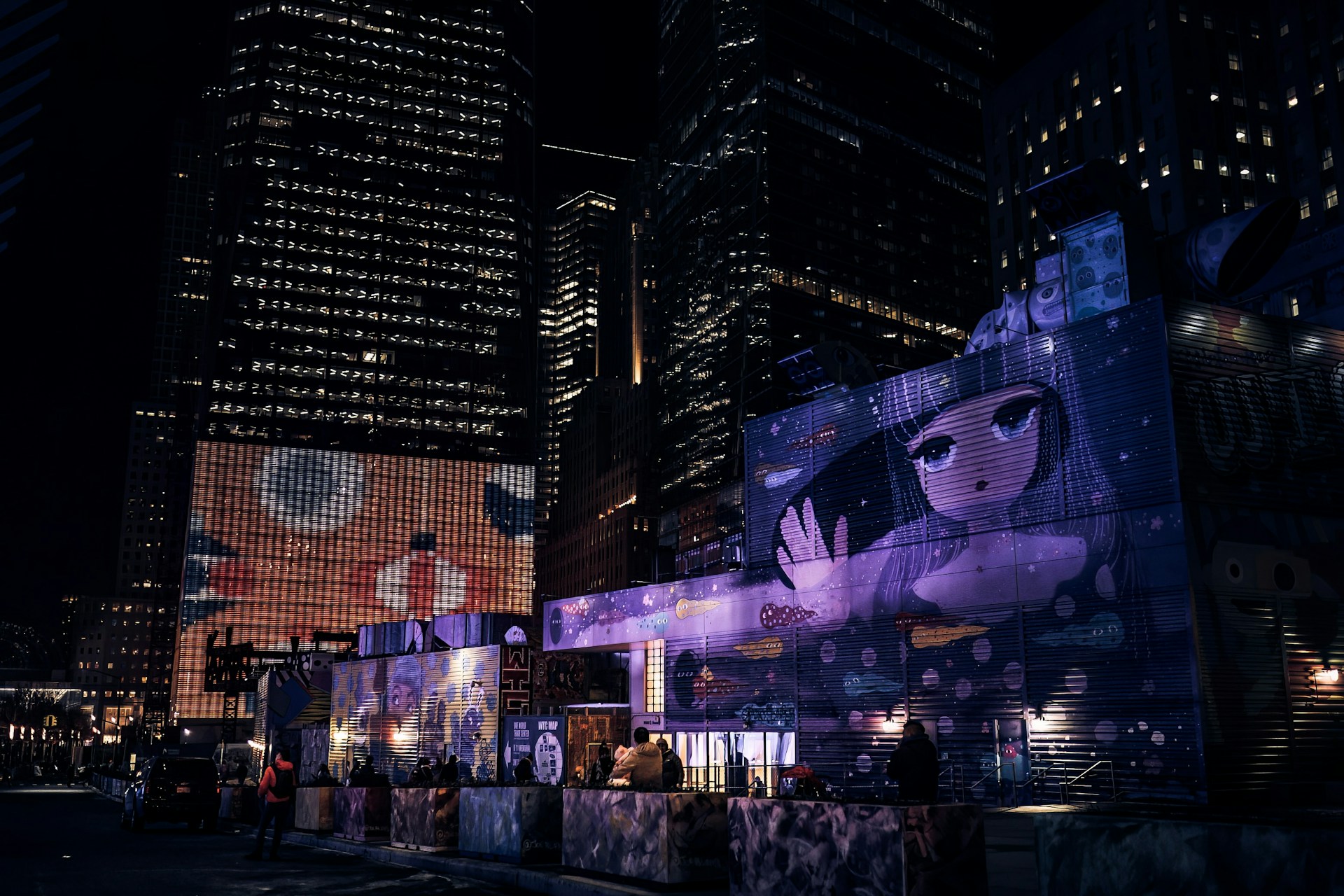 A vibrant anime-inspired metal wall art piece glowing softly against an urban loft backdrop.