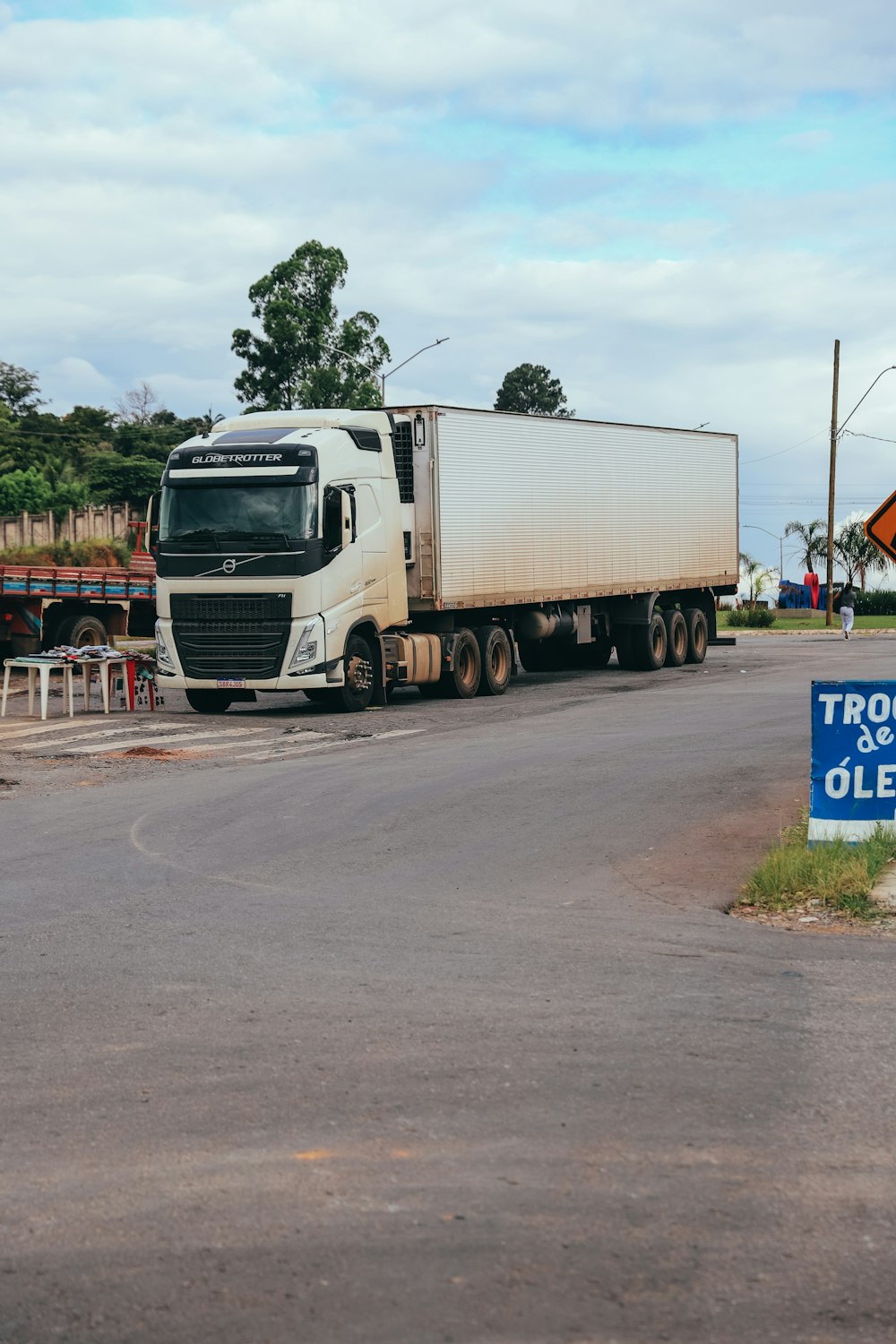 a truck is parked on the side of the road