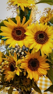 A beautiful sunflower arrangement with soft colors.
