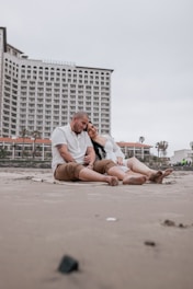 Couple relaxing on a serene beach in Kuakata.