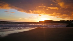 A stunning beach sunset with vibrant colors.