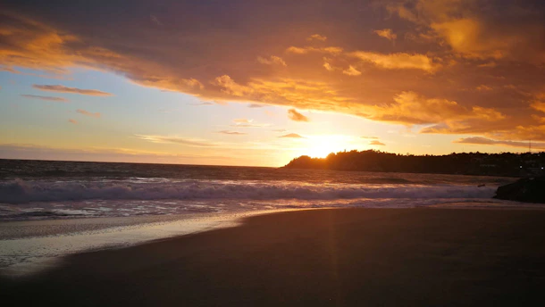 A stunning beach sunset with vibrant colors.