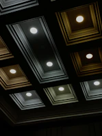 a group of lights that are on a ceiling