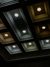 Decorative LED lighting embedded in a plaster ceiling creating a warm atmosphere.