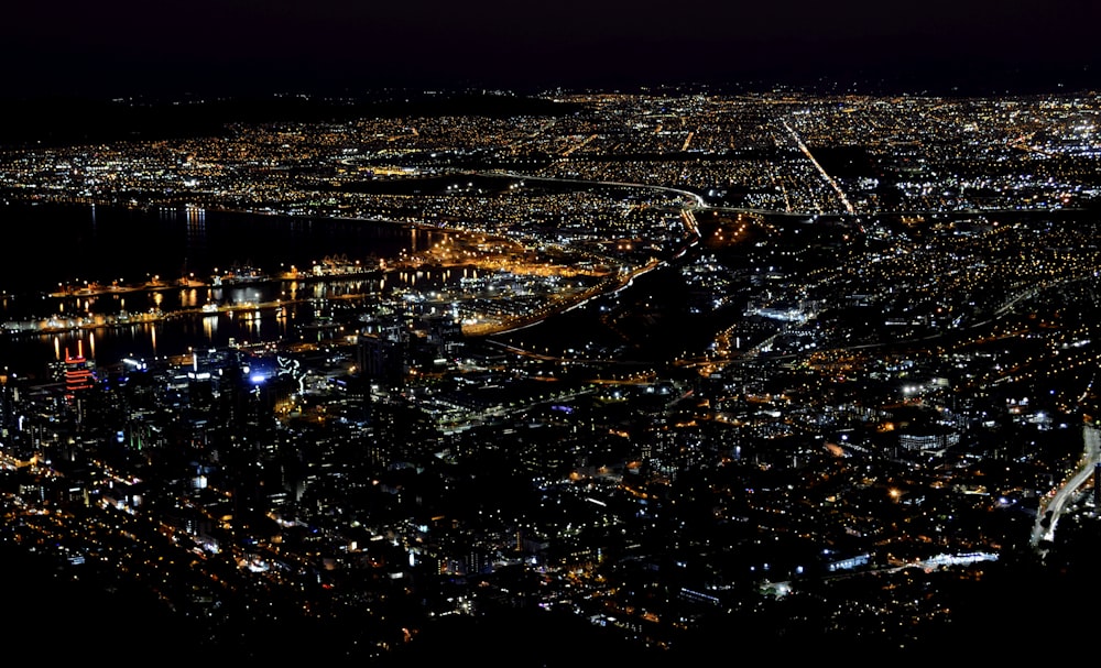 an aerial view of a city at night