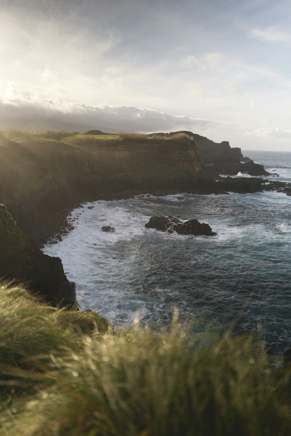 a view of the ocean from a cliff