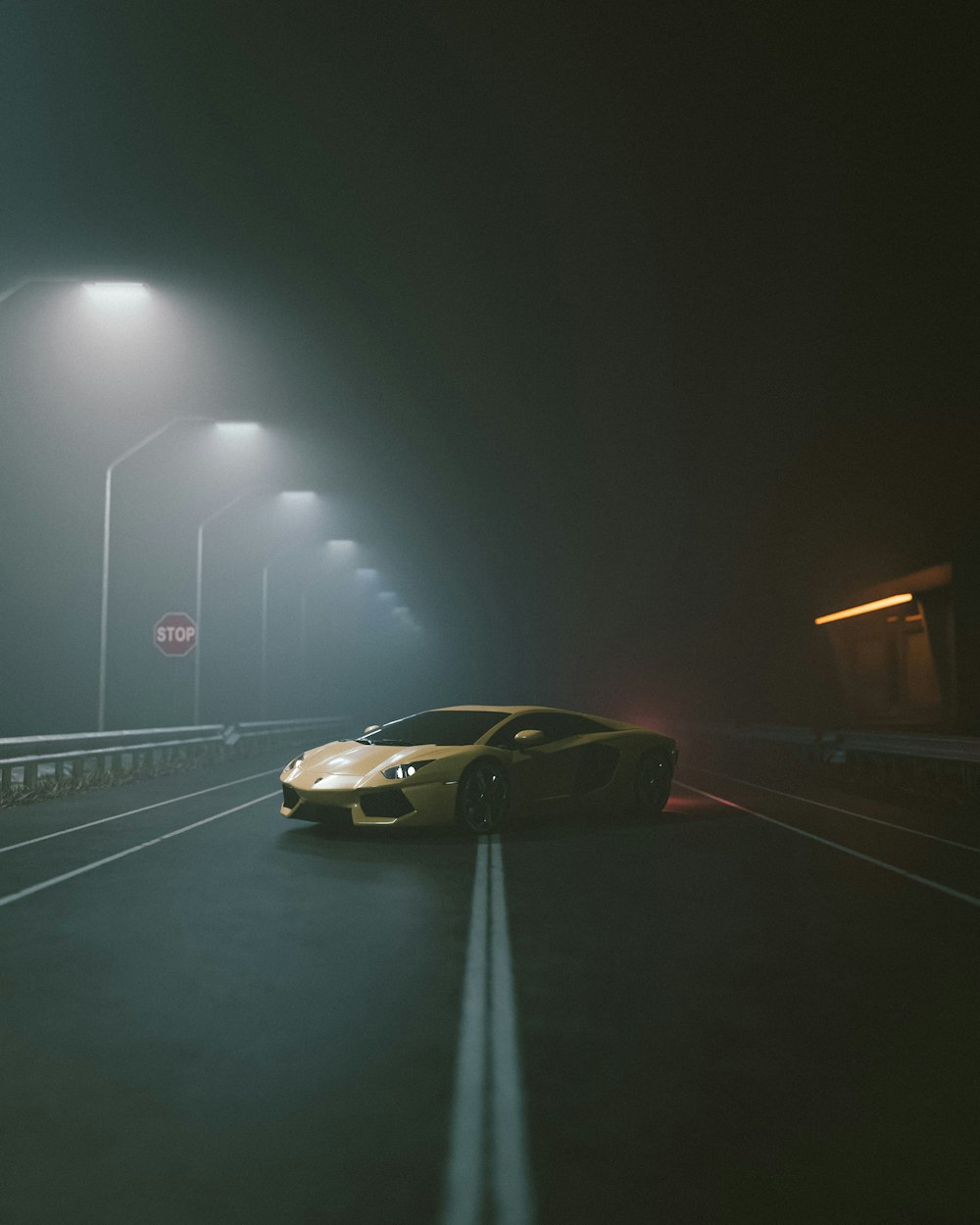 a yellow sports car parked in a parking lot at night
