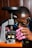 A technician fixing an appliance with care.