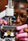 Close-up of a custom prosthetic hand being carefully adjusted by a technician.