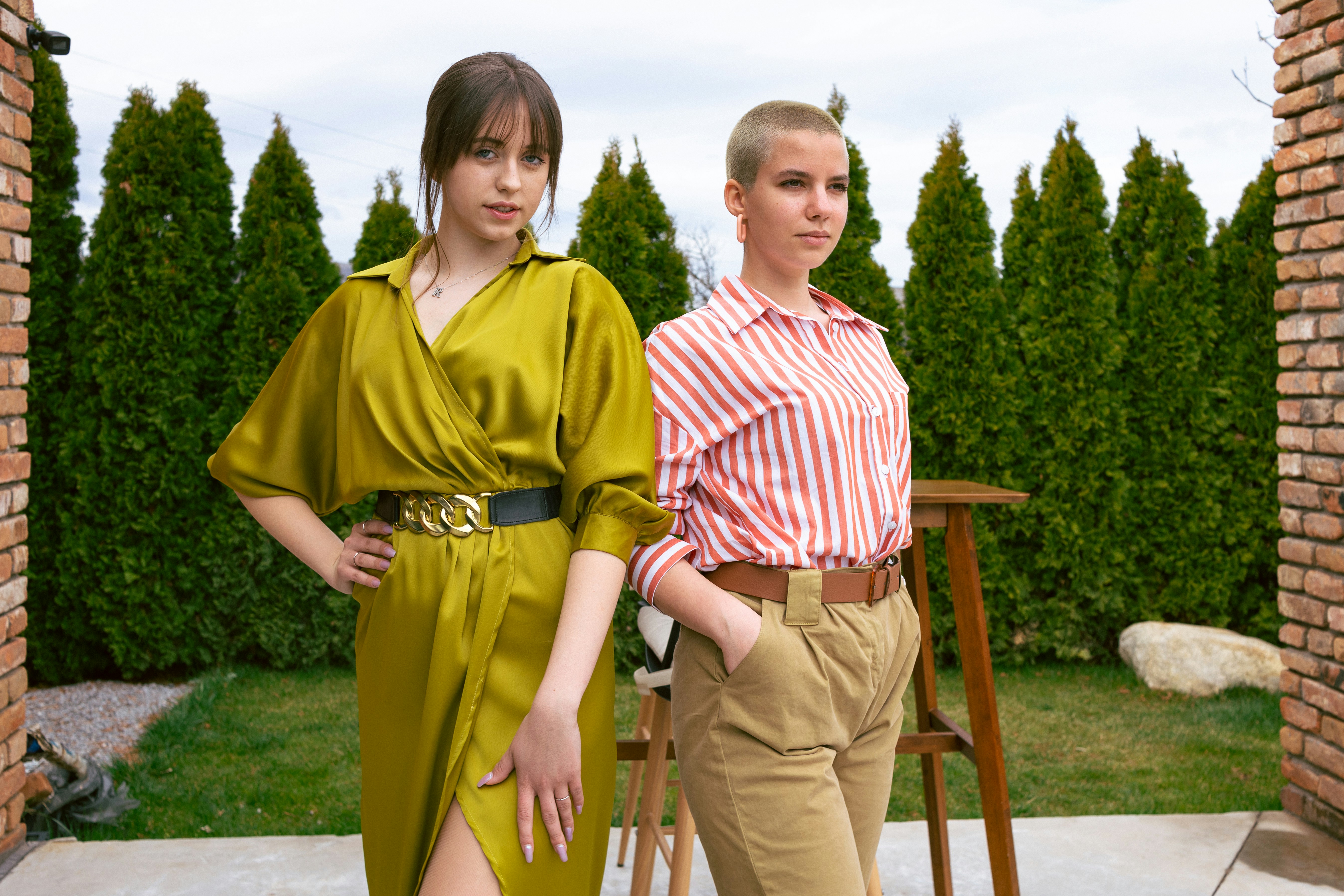 Women standing together in elegant fashion