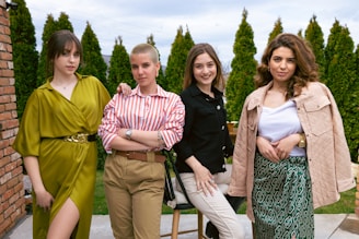 a group of women standing next to each other