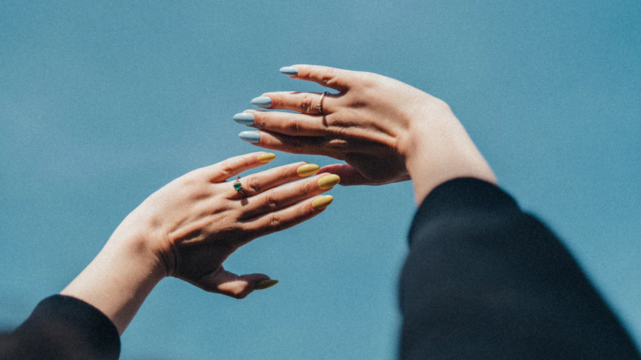 two hands reaching out towards each other