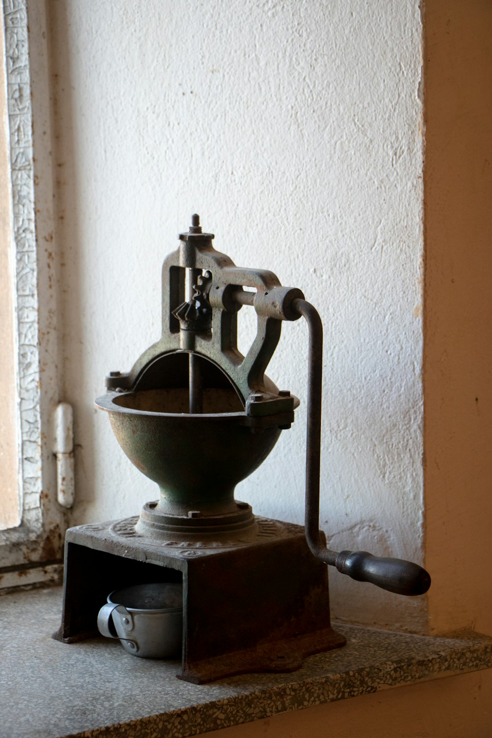 a coffee pot sitting on top of a stove