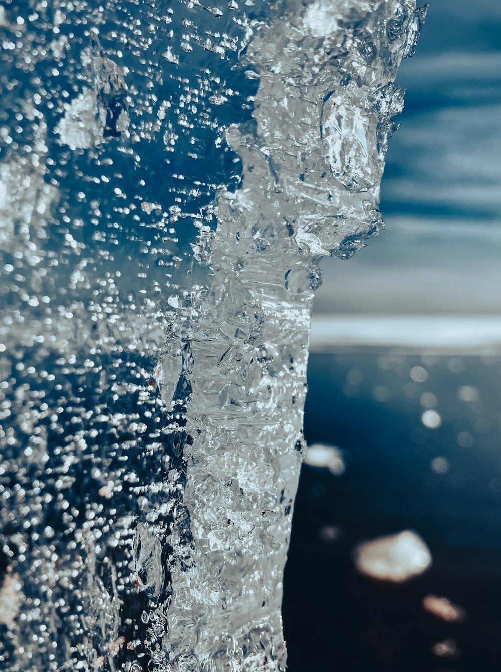 a close up of a water fountain with bubbles