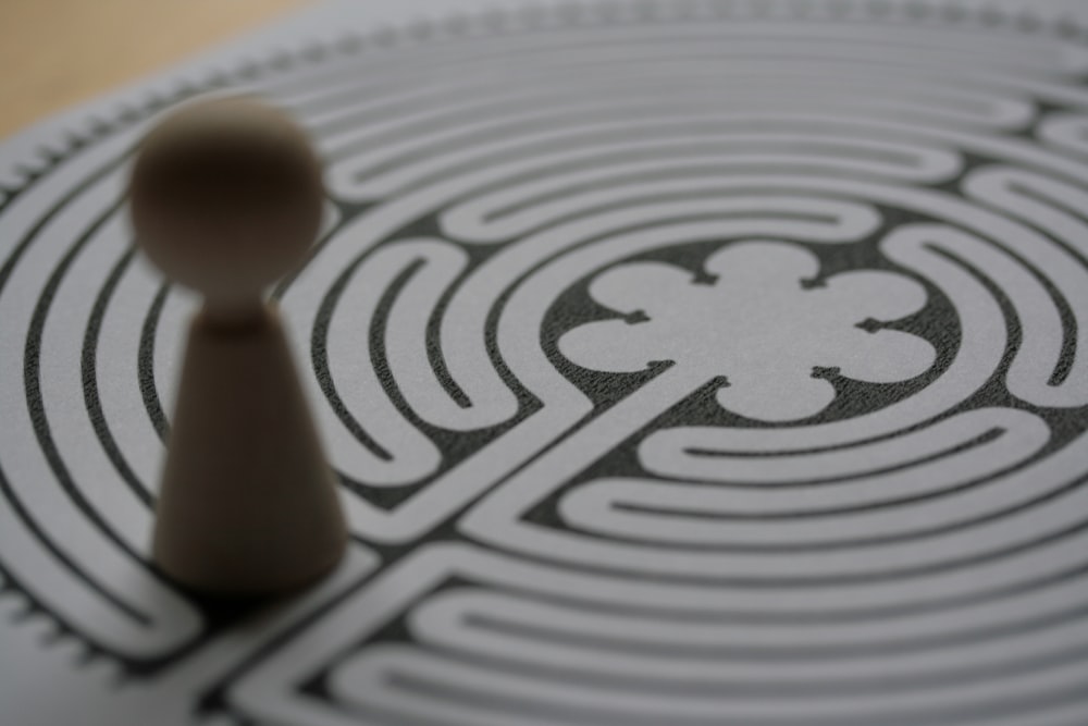 a close up of a toy standing in a maze
