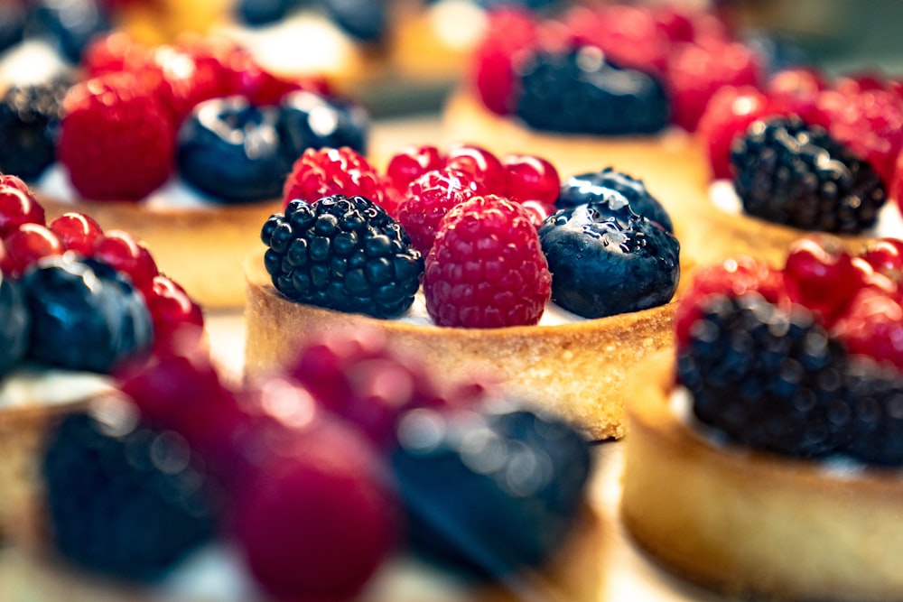a close up of a pastry with berries on it