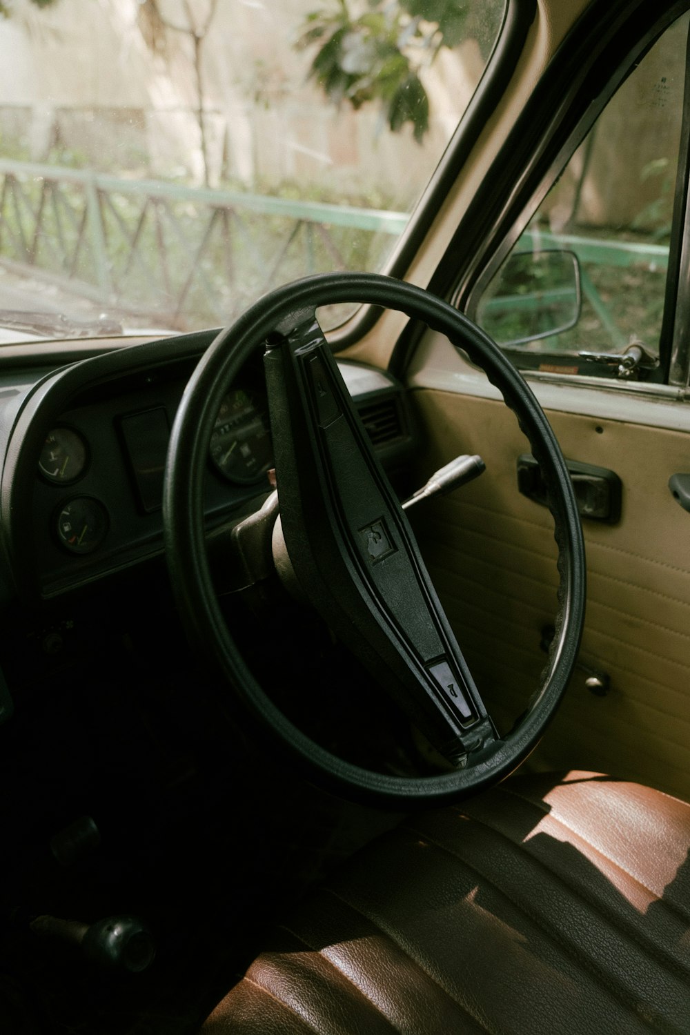 the interior of a car with a steering wheel