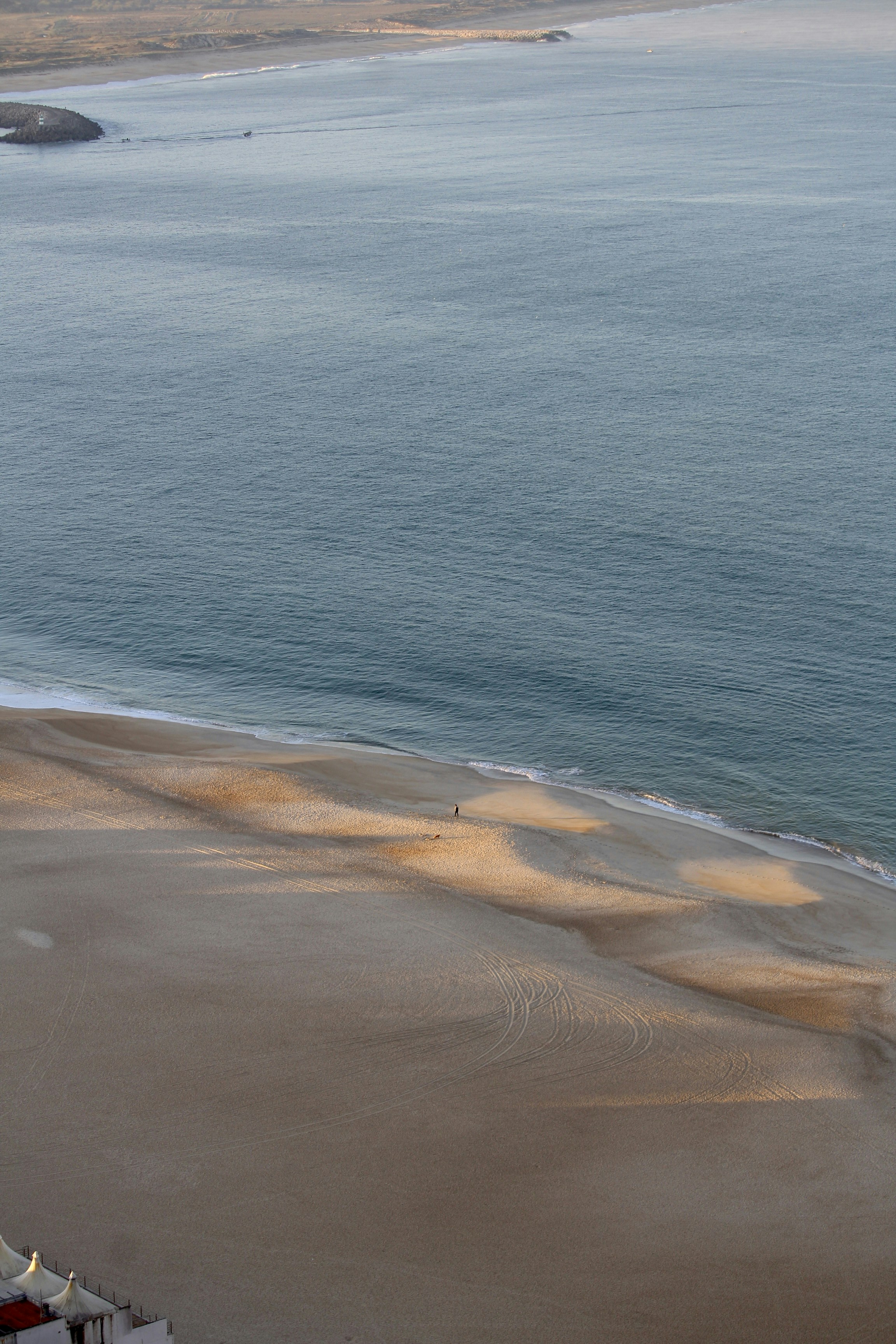 a view of a beach and a body of water
