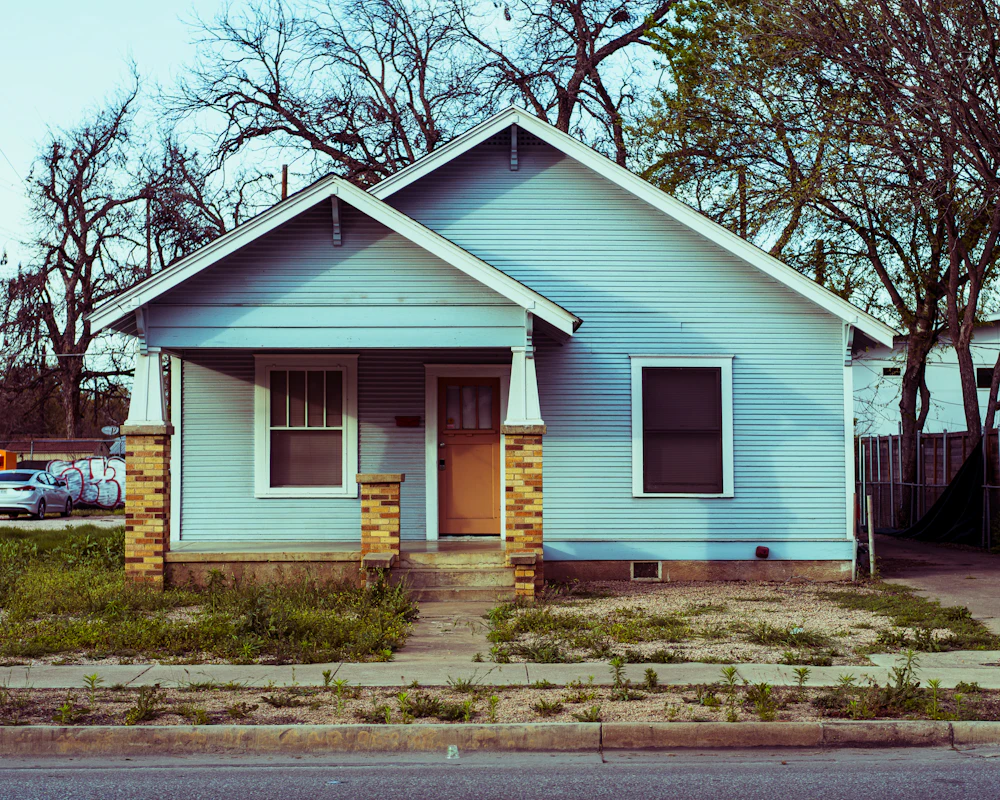 Pale blue cottage exterior