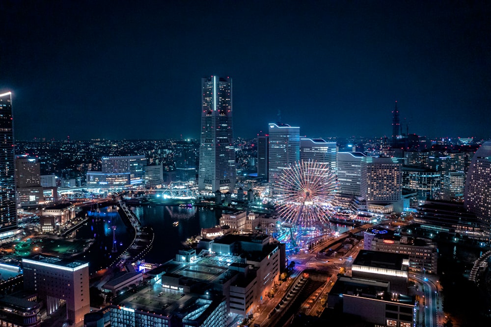 a view of a city at night from the top of a building