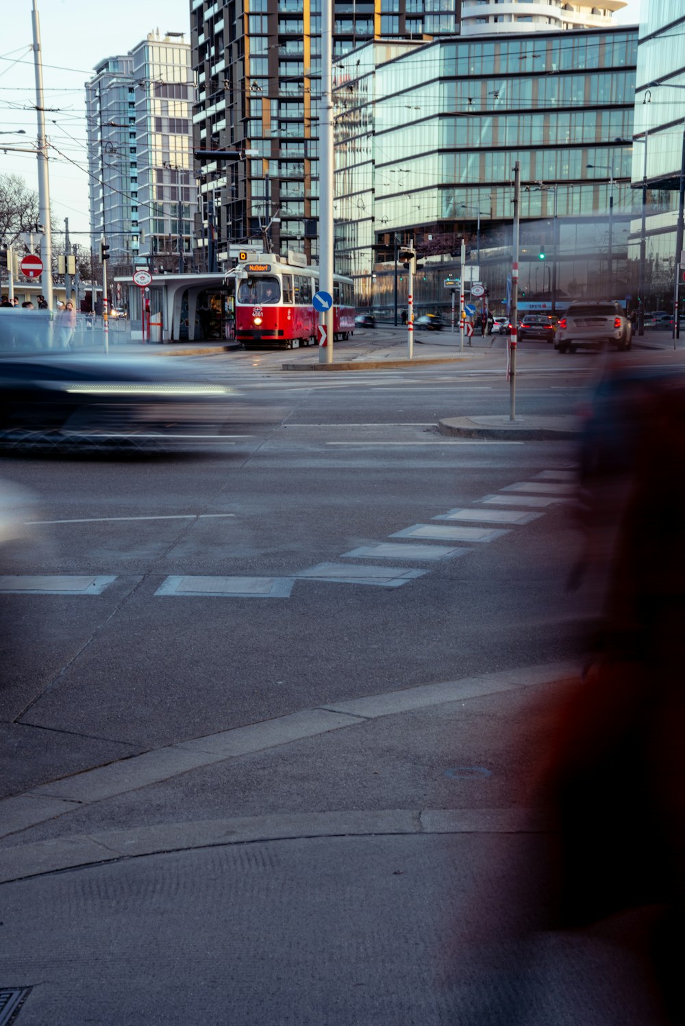 a blurry photo of a city street with a bus