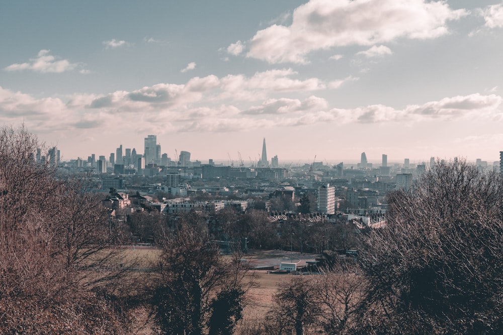 a view of a city from the top of a hill