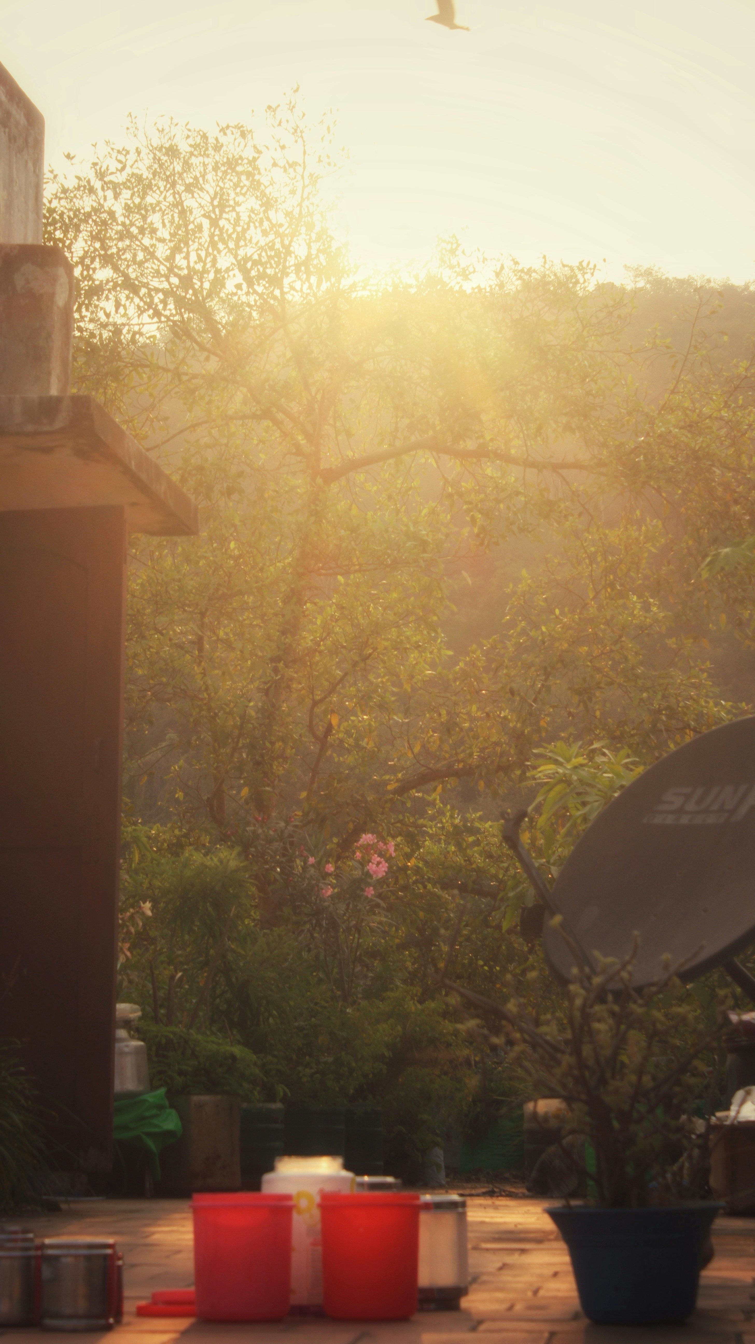 a satellite dish sitting on top of a wooden table