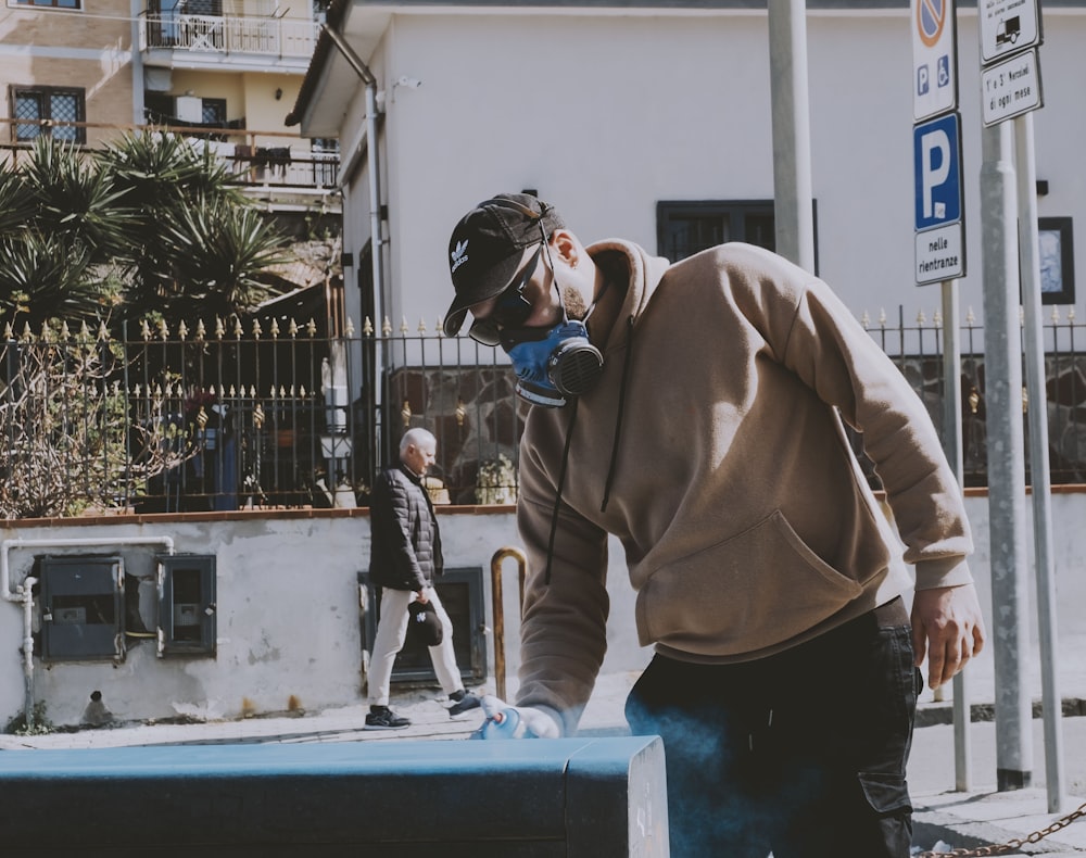 a man wearing a face mask and protective gear