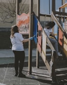 Volunteers and locals collaborating on building a small playground in the neighborhood.