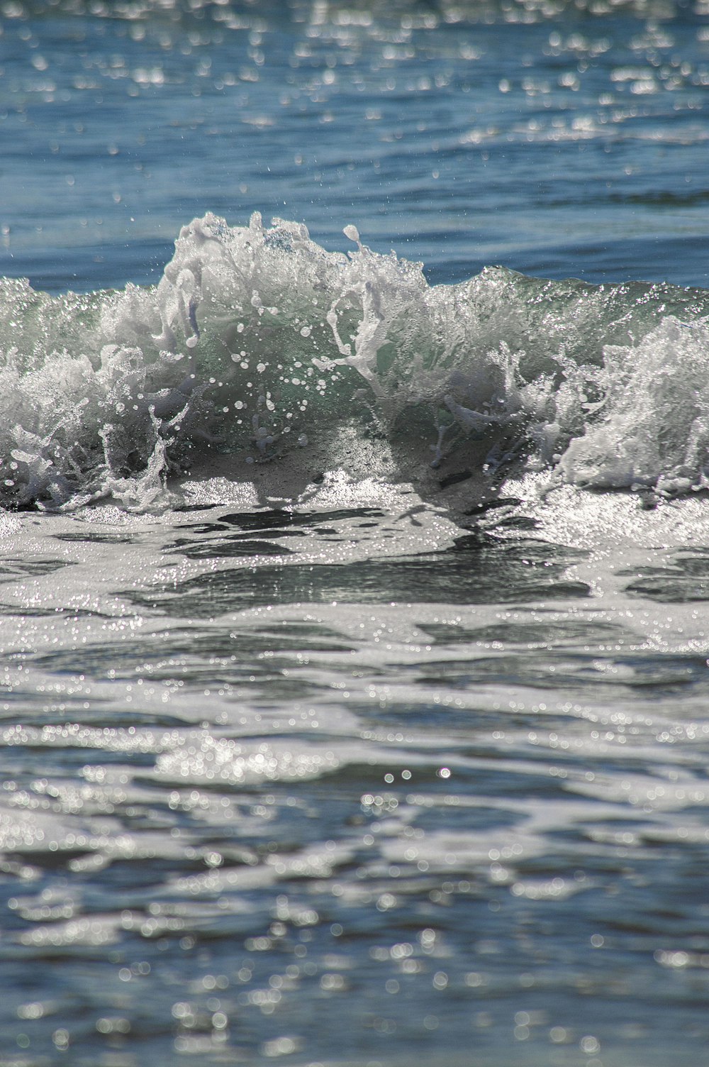 a close up of a wave in the ocean