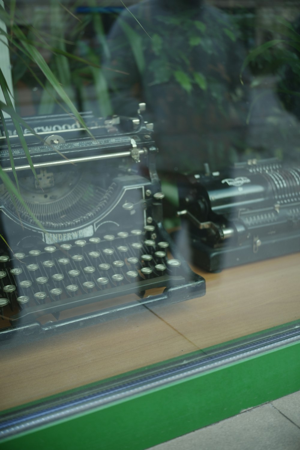 a close up of a window with a typewriter