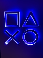 Minimalistic crypto-inspired geometric shapes glowing on a dark background.