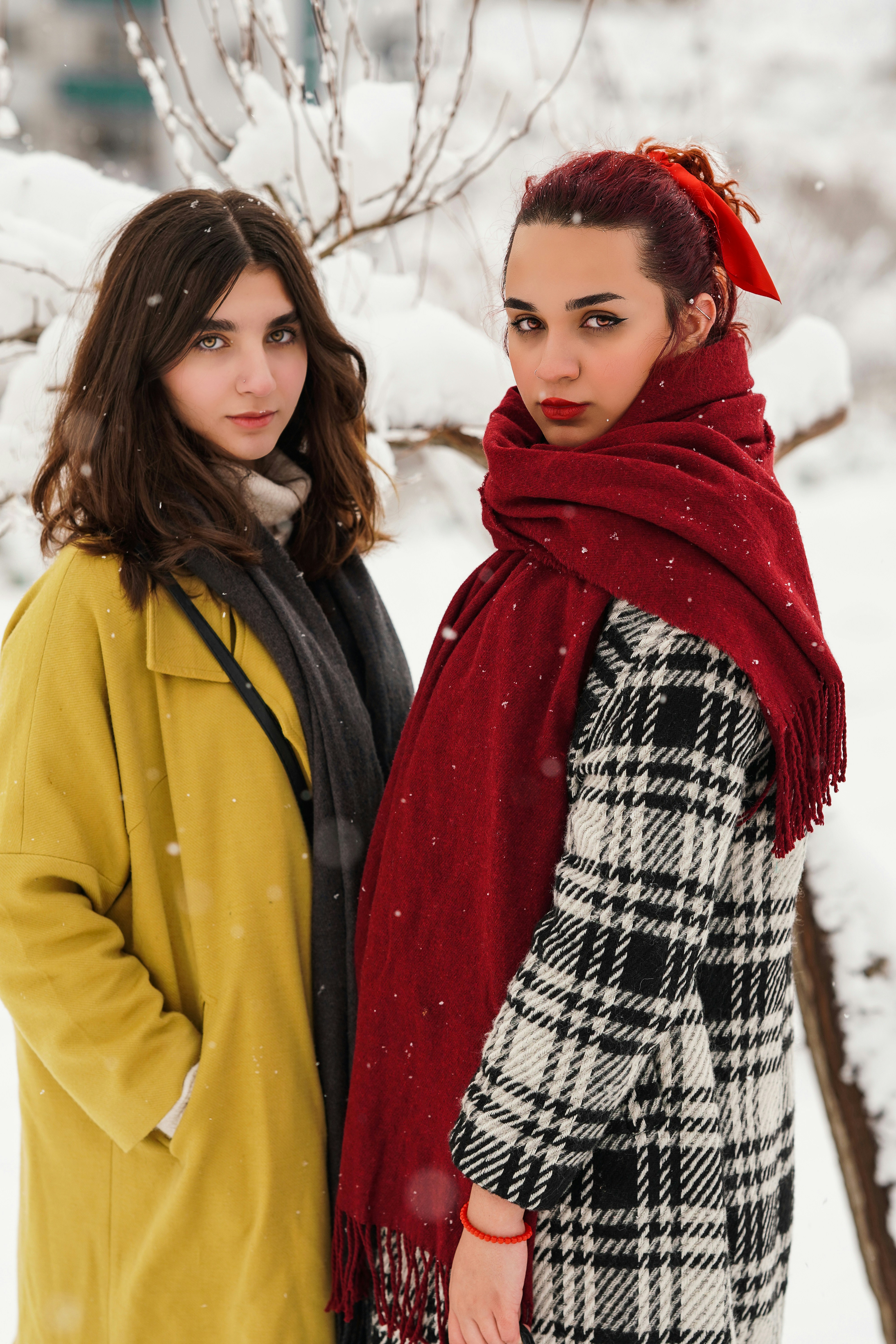 How to Style Scarves for Every Season: Effortless Looks You’ll Love – two women standing next to each other in the snow