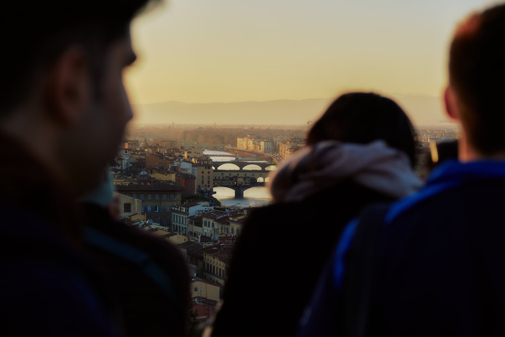 a couple of people standing next to each other