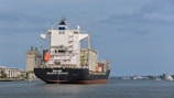 a large cargo ship in the middle of a body of water